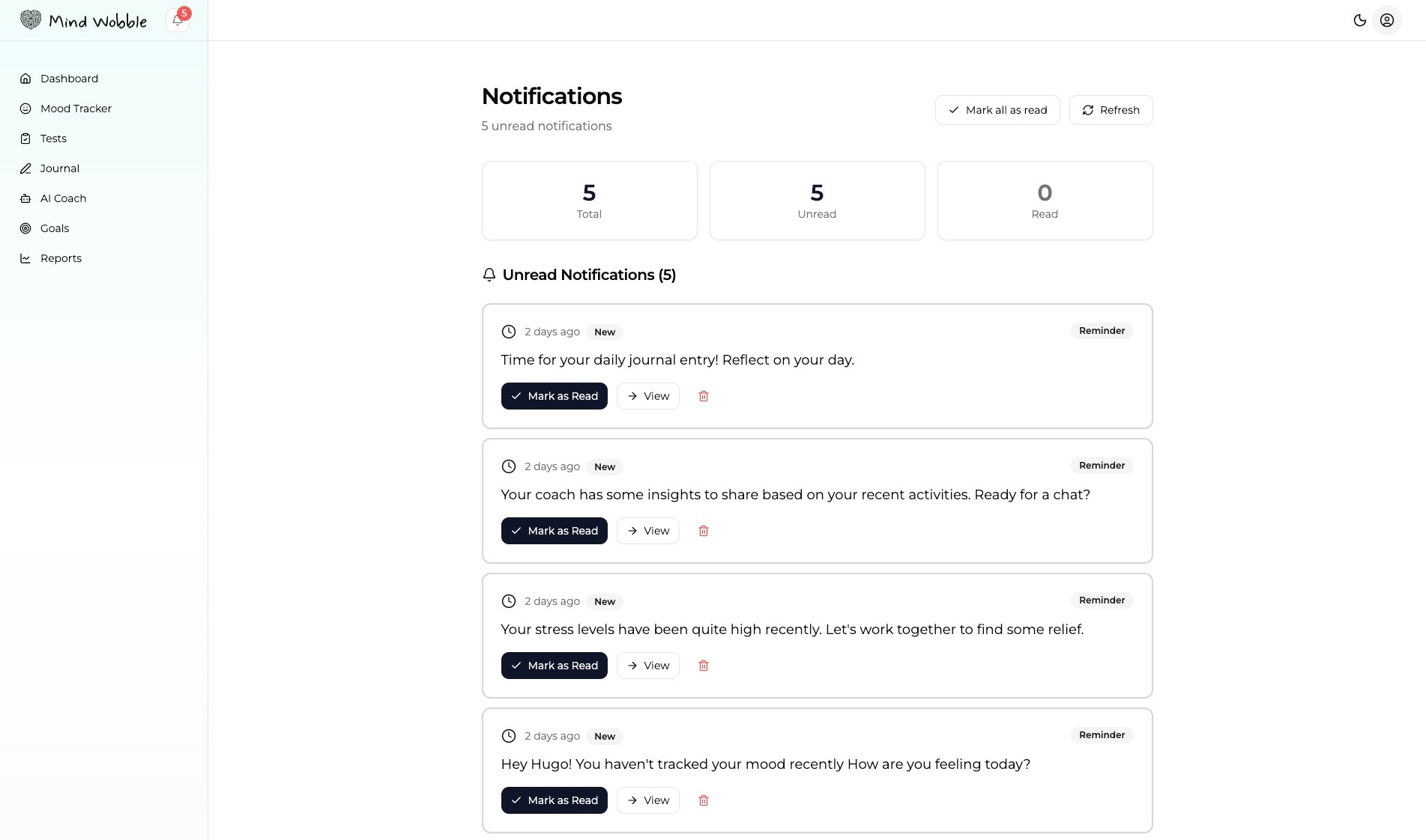 Show the Mind Wobble notifications page with unread notifications, read notifications, type badges, dates, mark as read, open link, and delete actions visible.